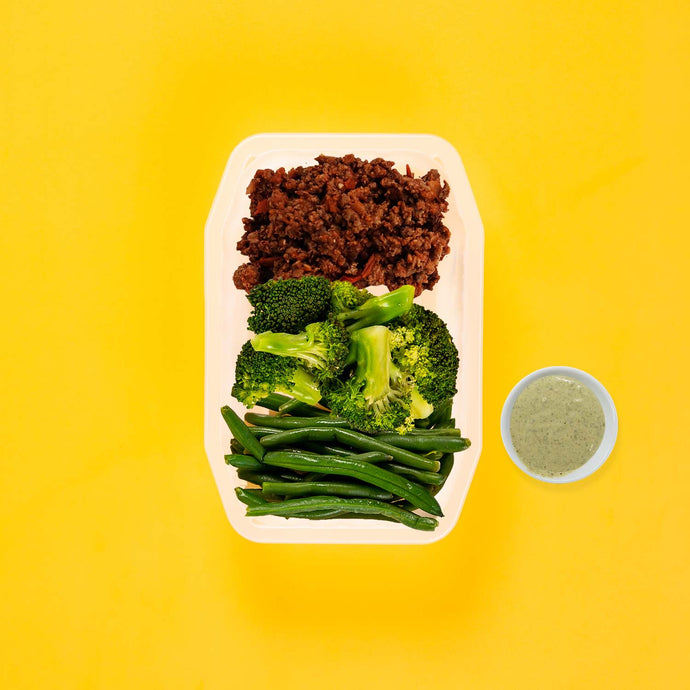 100g Lamb Moussaka 100g Broccoli 100g Green Beans Pesto Cream